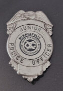 My junior police officer badge, earned in elementary school. 